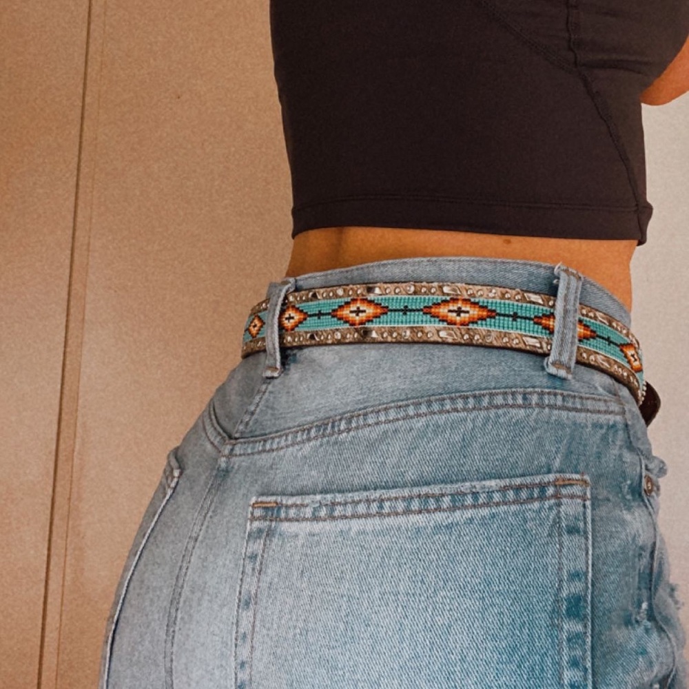 Western beaded Ariat belt with cow hide